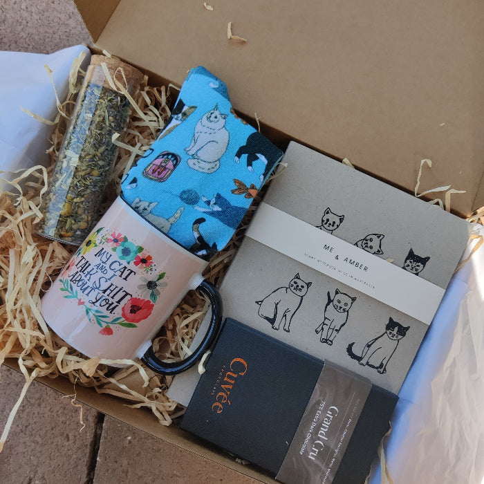 this is an image of a cat giftbox for a cat lover, low tox, great for mother's day
