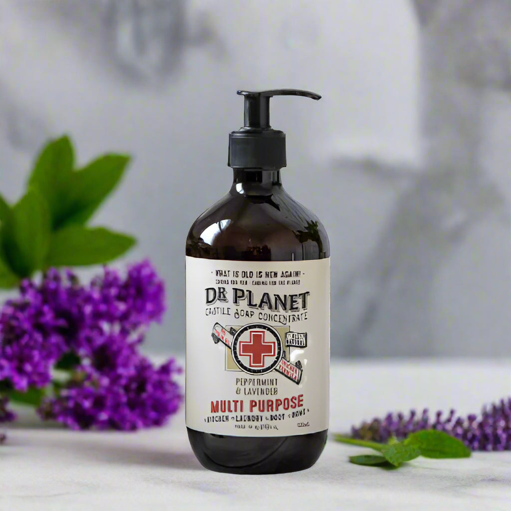 A bottle of Dr Planet Castille Soap with a pump dispenser, labeled as multi-purpose soap.