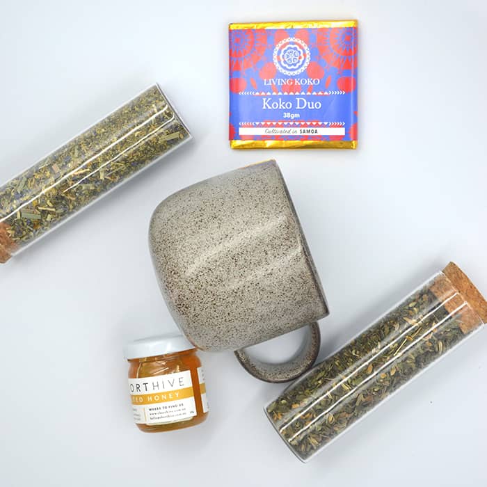 gift hamper mug chocolate honey and tea in test tubes
