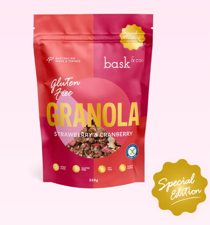 Bag of Bask & Co. strawberry and cranberry granola with a pink and red design.