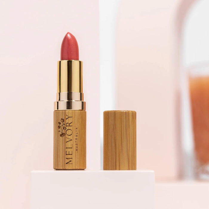 image of a red lipstick with lid on top