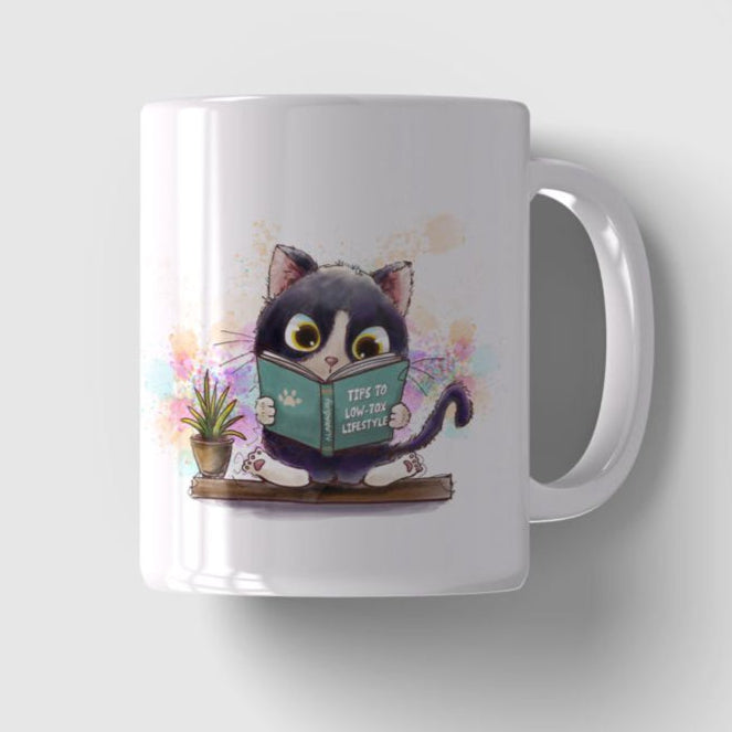Two white mugs with one featuring a cat illustration and the other displaying a QR code.