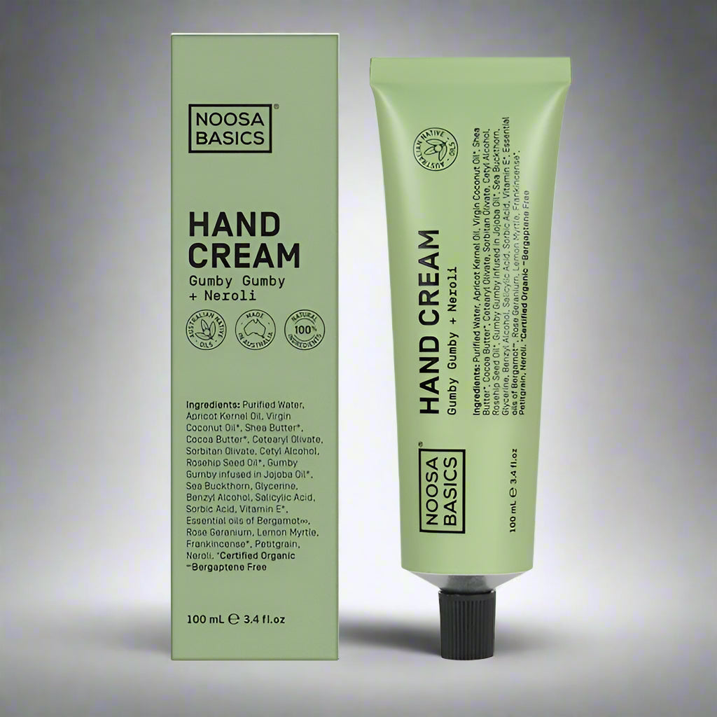 Noosa Basics Hand Cream packaging and tube, with branding and text detailing the ingredients including Gumby Gumby and Neroli.