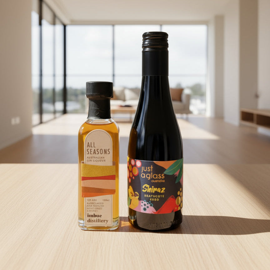 Two bottles of alcohol on a table with a modern interior background