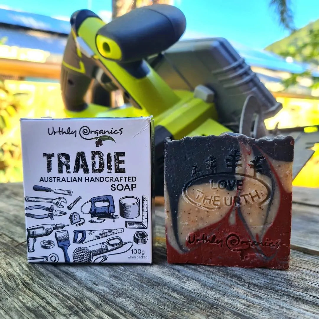 Uthly Organics Tradie Australian Handcrafted Soap with packaging on a wooden surface.