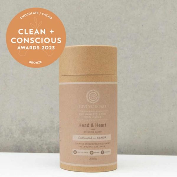 Cosmetic container with 'Living Body' branding on a neutral background, featuring 'Clean + Conscious Awards 2023' badge.