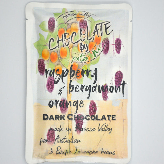 image of a packetof vegan chocolate with raspberry and bergamont mixed through it