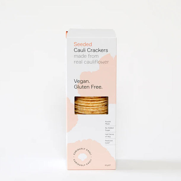 Box of Seeded Cauliflower Crackers on a white background