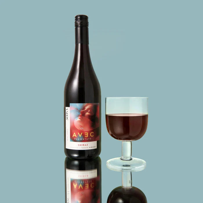 Wine bottle labeled 'AVEC' with a glass of red wine on a light blue background