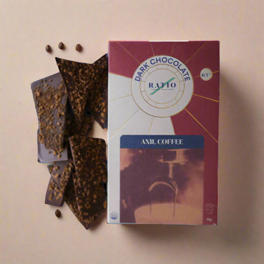 Dark chocolate bars and a box of Raffo dark chocolate on a white background