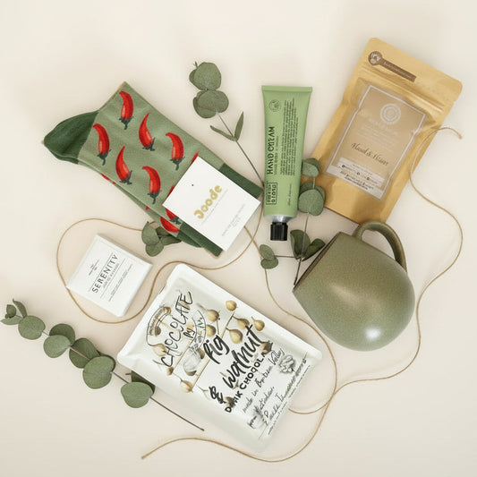 Collection of low tox items - drinking chocolate ,mugs, noosa basics hand cream ,peter M chocolate and shower steamer.
