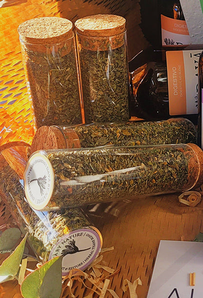 Glass test tubes filled with herbal tea