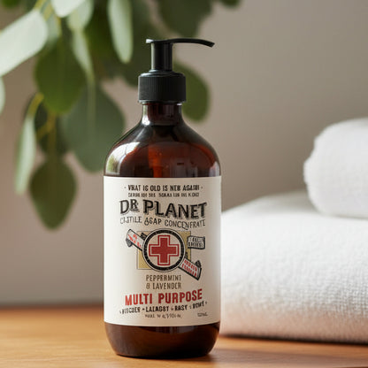 A bottle of Dr Planet Castille Soap with a pump dispenser, labeled as multi-purpose soap.