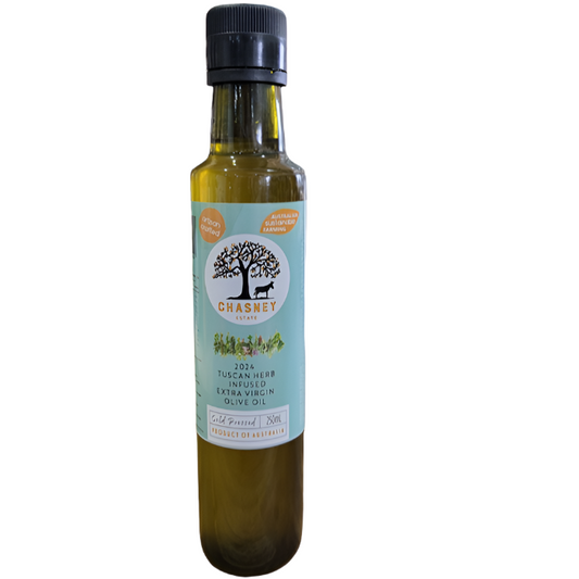 Glass bottle of Chasney brand Tuscan herb-infused extra virgin olive oil with light blue label