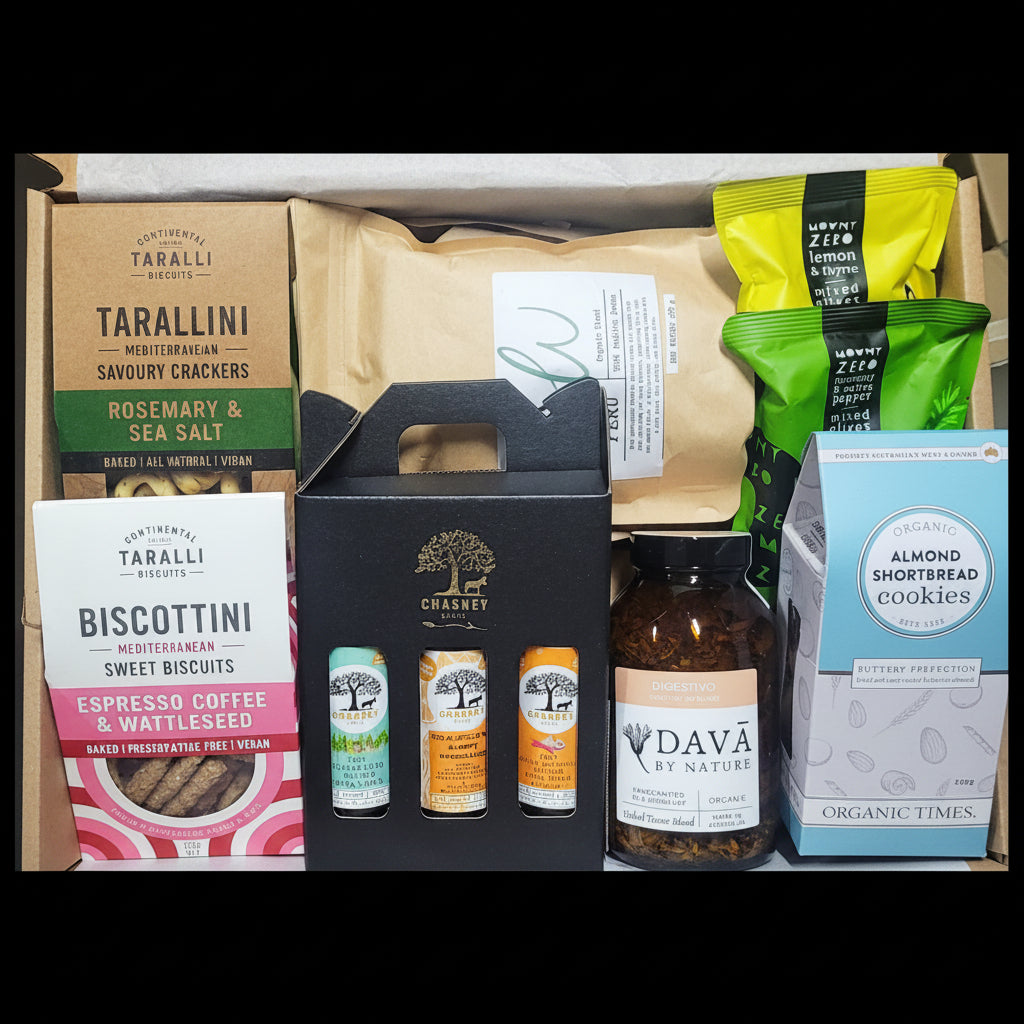Assorted gourmet food items including Tarallini, Biscottini, and Dava in a box.