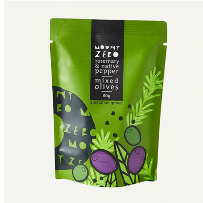 Green package of Mount Zero rosemary and native pepper mixed olives on an orange background