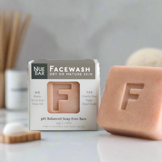 Nue Bar Facewash soap bar and packaging on a white background with awards displayed.