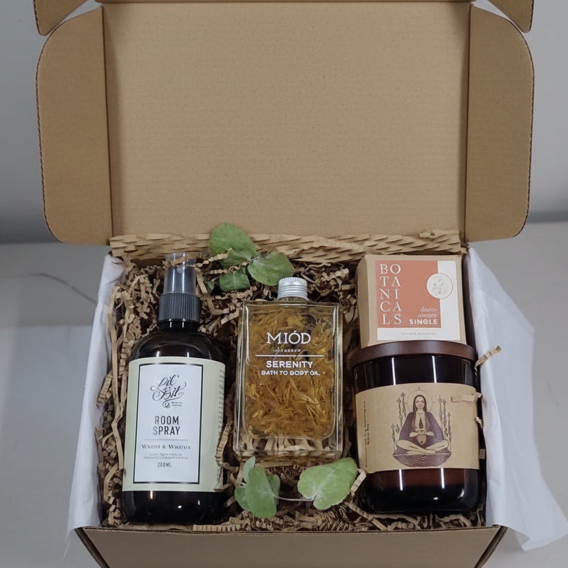 Collection of skincare products in a box with visible labels and packaging.