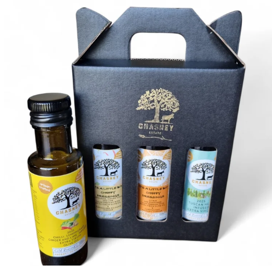 Set of Chasney olive oil bottles in a branded box on a white background