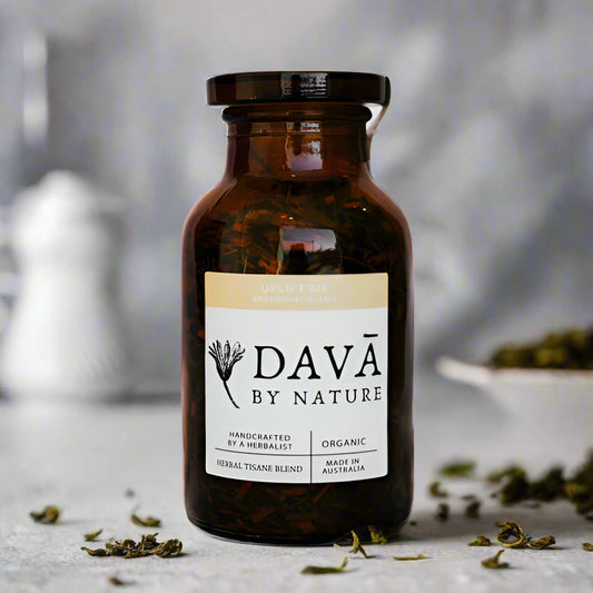Brown glass bottle with a label reading 'DAVÔ BY NATURE' on a white background
